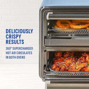 SmartSynx Dual Door Air Fryer Oven, featuring a stainless steel design and dual compartments for cooking multiple foods at once.