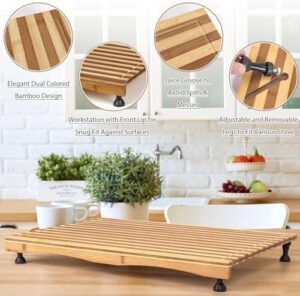 Bamboo stovetop cover with adjustable legs, doubling as a cutting board for gas and electric stoves.  