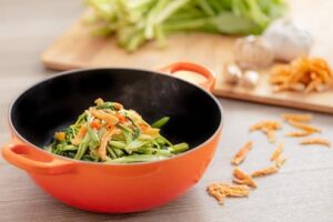Le Creuset Enameled Cast Iron Balti Dish, 3 qt., Flame in vibrant orange color
