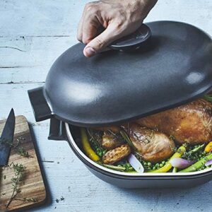Emile Henry Delight Ceramic Oval Dutch Oven 4.5L in Slate color, showing off its elegant design and durable ceramic construction.
